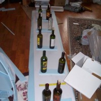 Nolan_Backdrops_1_using_wine_bottles_for_weight_480x