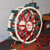 My homemade Ferris Wheel. In the back round is the lighthouse that I built.