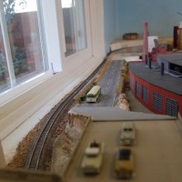 looking down the road. The ramp and bridge deck still need finalization, only base coats, so far.
