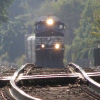 A NS train approaches the Charlottesville VA interlockings on a hot day.
