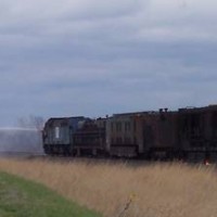 Rail grinder fights fire with water cannon