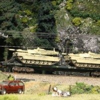 Kitbashed DODX flatcar, Pewter M1A1 tanks