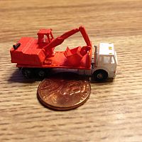 small crane on flat bed