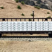 UP 260114 with Serria Pacific packaged lumber load.