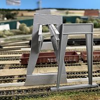 3D printed Gantry Crane legs next to Cardboard mock-up #1