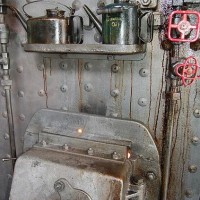 Firebox door, oil cans