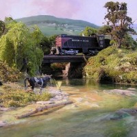 HO scale Proto2000 Boston and Maine S1 crossing the Pinchbeck River.