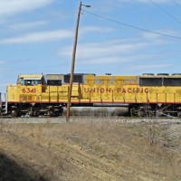badly-faded UP SD60M, Ray Yard, Denison, TX