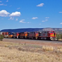 WB stack train just west of Mountainair, NM, waiting for fleet of eastbounds (and another westbound ahead of it) to roll before it runs thru the single-track Abo Canyon. Once thru this bottleneck, it's clear sailing to the crew-change point at Belen.