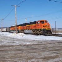 BNSF 9362 leads an eastbound coal drag thru Burlington, IA. The train will cross the Mississippi River to head to Galesburg.
January 21, 2009.
