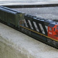 SD40 CN 5243 - Bought used at same show as GP7. Runs nicely, snowplow pilot, a subtly weathered, my first loco after the 30-year drought. This is the one that made me decide to model CN.

I will probably renumber it to 5000 - 5243 is a wide-cab model and that's a bit harder to do than messing with decals...