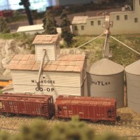 Sand Springs Railway - Muskogee Co-op is a building I scratchbuilt to provide a siding.  The Butler Tank names are made from different size dry transfers