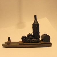 N scale steam donkey. Scratchbuilt sled, fairlead, water tank.
Added rods, valve gear and all piping to resin casting.
