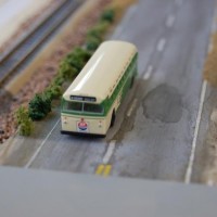 Close up of the road, and a WOT SF Muni bus (#35 Geary line)