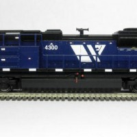 Kato SD70ACe MRL 4300.  Used Model Masters acryl "Blue Angel Blue". Used Trainworx SD70ACe/M-2 detail set and BLMA grab irons.  Moved Headlight to the nose, shaved off number board backing to make more correct, removed smaller GPS dome and lowered rear headlight.  Rear of underframe was milled to make rear grills see-through.