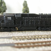 Shot #2...GP30 high hood build.

Repainted entire engine and trucks with matte black, and reattached the nose section.

[Atlas GP30 with Bachmann GP50 high hood shell addition]