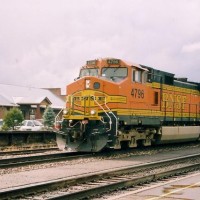 A hot container freight blasts on the whistle as it speeds through Flagstaff depot in 2004