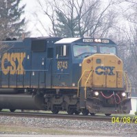A SD60MAC (ex-Conrail) leads an intermodal train south then west through Fostoria, Ohio.