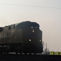 A UP ES44AC leads an autorack train through Leipsic, Ohio.