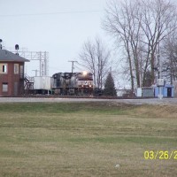 A NS roadrailer enters town from the east.