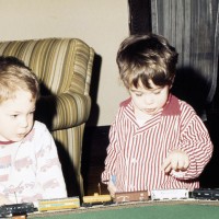 Me (on the left) and my little brother with our first N-scale layout, Christmas 1972.  I still have the UP stock car (yellow on the left) and I think the reefer.  Wonder what ever happened to the FA?