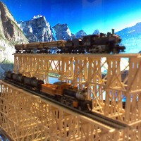 Two level wood trestle bridge with two Z scale Trains 6"Hx12"L second level 4"H one piece