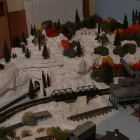Corner shot of the mountain with two tunnels. one single other double track!