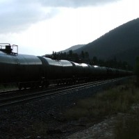 Last light in the rain at Crescent with a block of tank cars