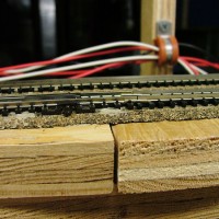 ties inserted under joints in rails
