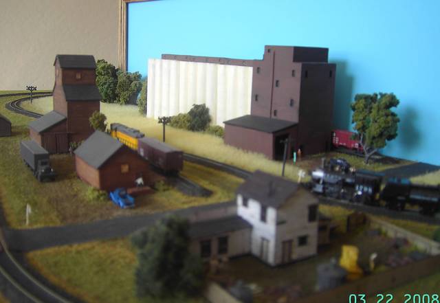 back side of layout with static grass field