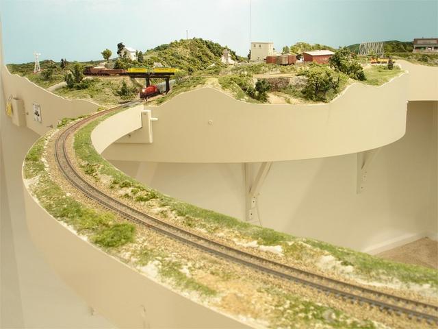 Close up of removable bridge.  Note the side banks to keep the cars on the track if bumped.