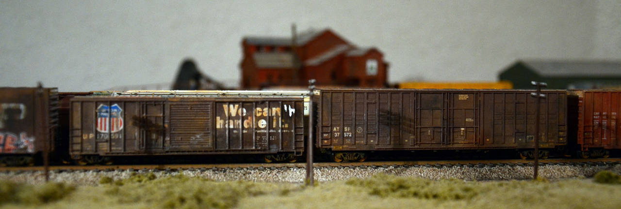 some weathered boxcars ...